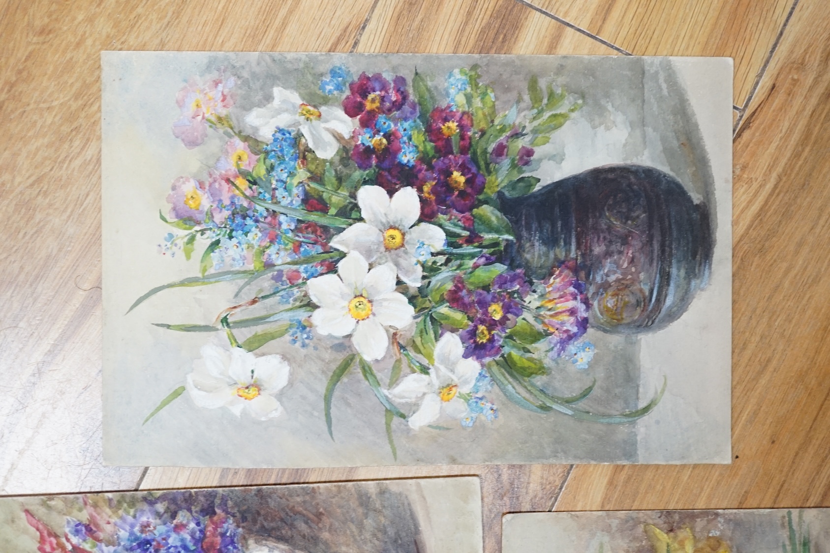 Annie L. Pressland (1862-1933), four watercolours on card, ‘Blue Cranesbill & Musk Mallow’, ‘Daffodils & Mimosa’, Yellow Snapdragons & Cornflowers’ and ‘Narcissi & Auriculas’, one signed, unframed, largest 27 x 17.5cm. C